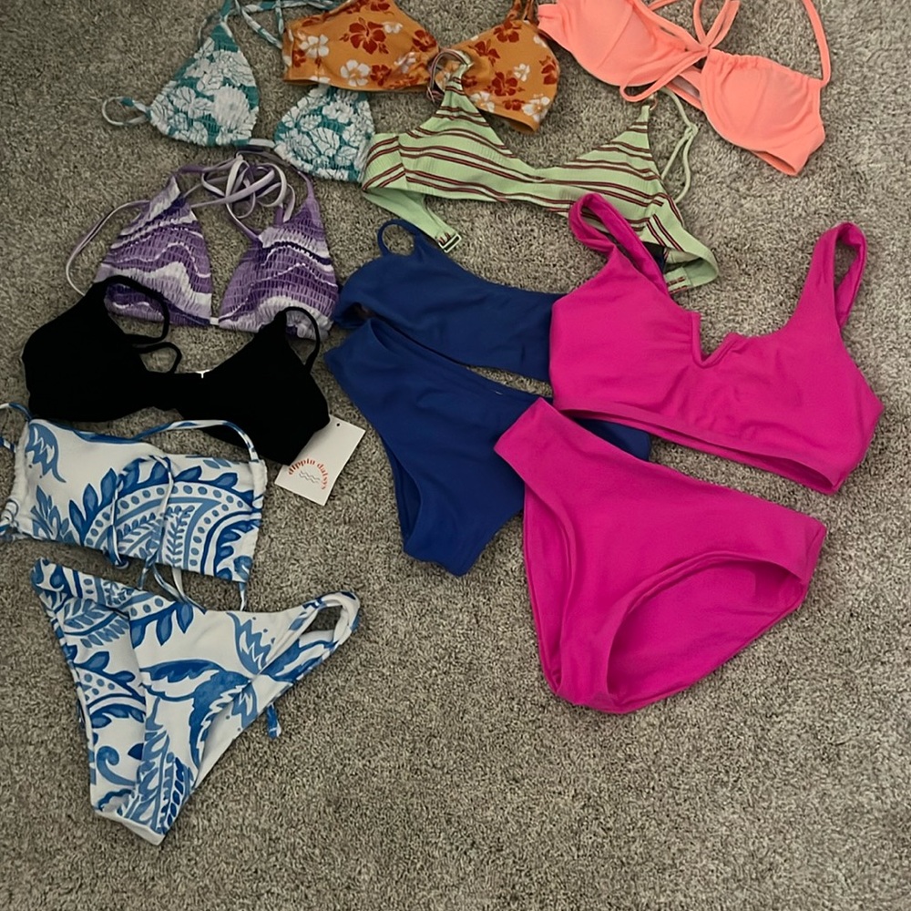 SELLING A BUNCH OF BIKINIS ON MY PAGE
